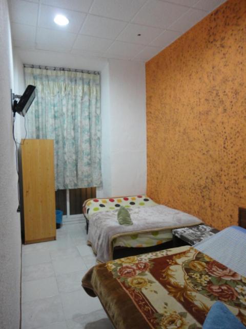 Quadruple Room with Shared Bathroom