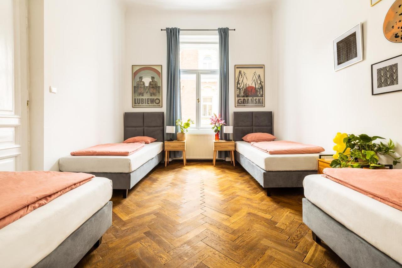 Chambre Quadruple avec Salle de Bains Commune