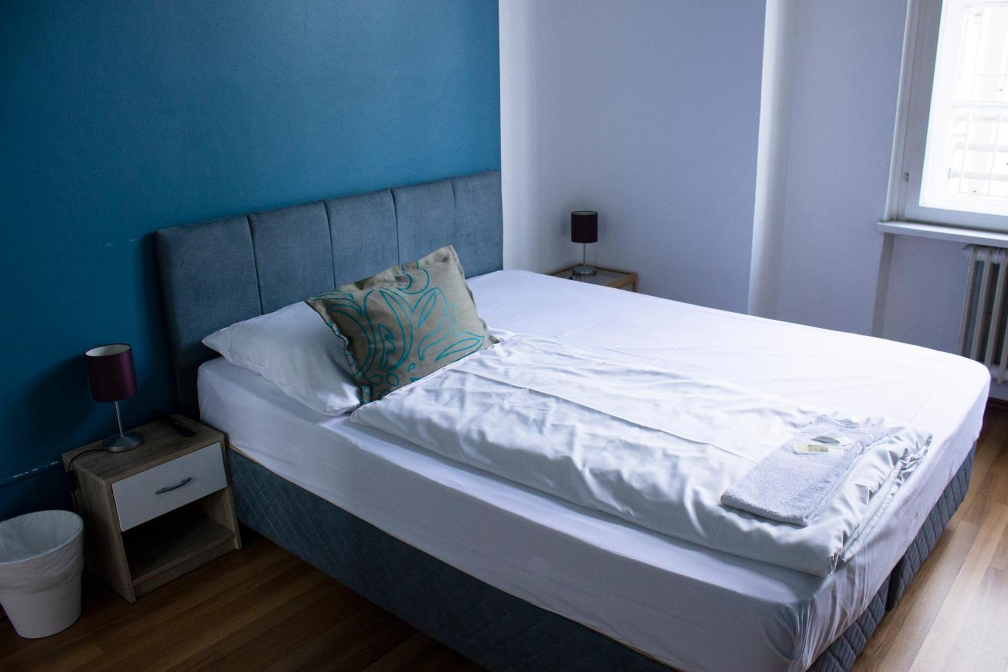 Chambre Quadruple avec Salle de Bains Commune
