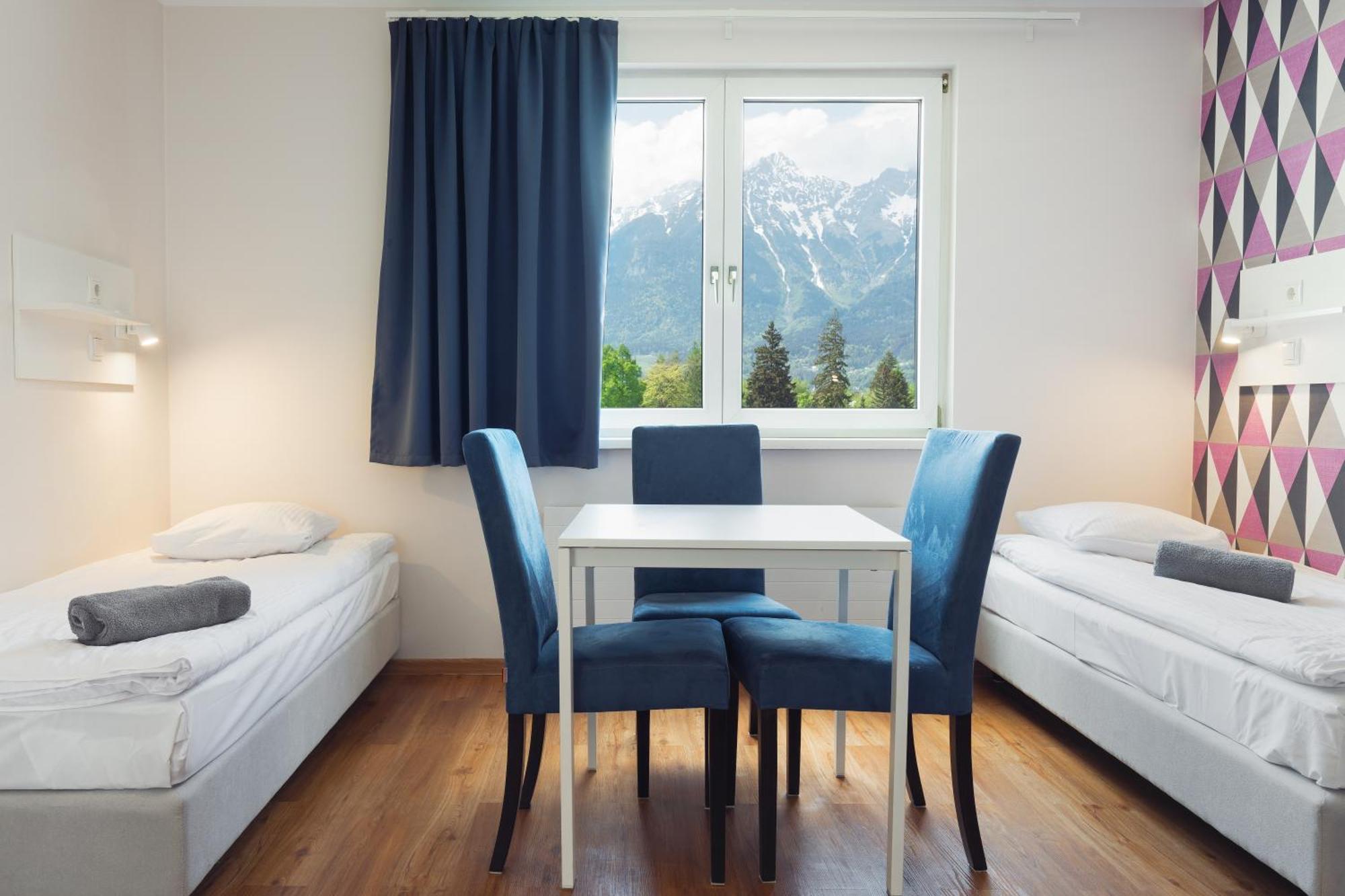 Chambre Triple – Vue sur Montagne