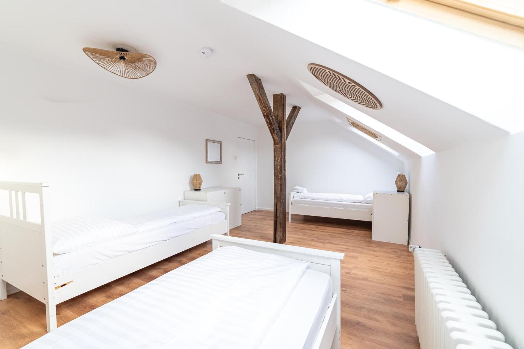 Chambre Triple Grenier avec Salle de Bains Commune