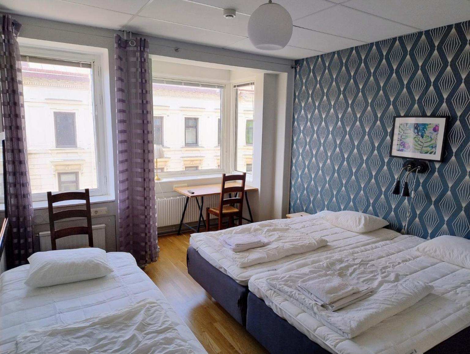 Chambre Triple avec Salle de Bains Commune