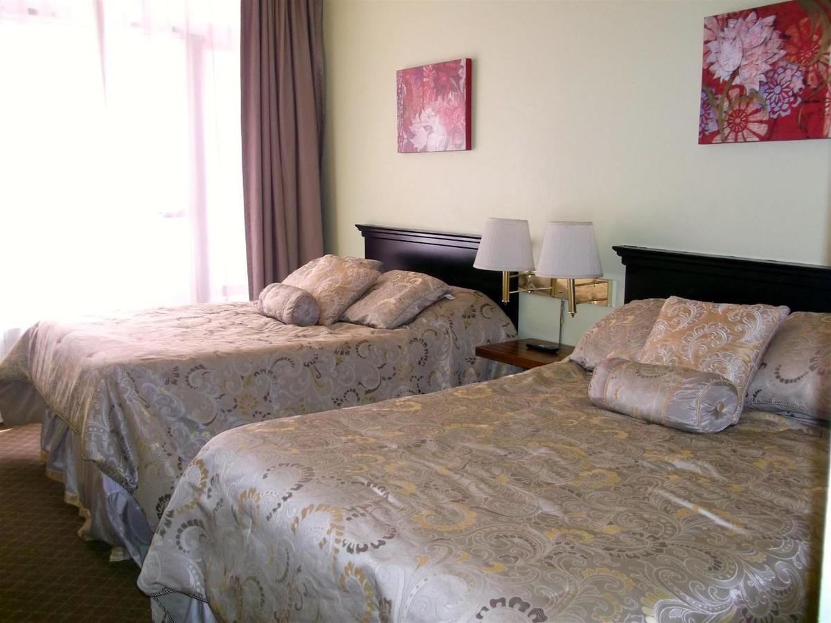 Chambre Quadruple avec Salle de Bains Privative