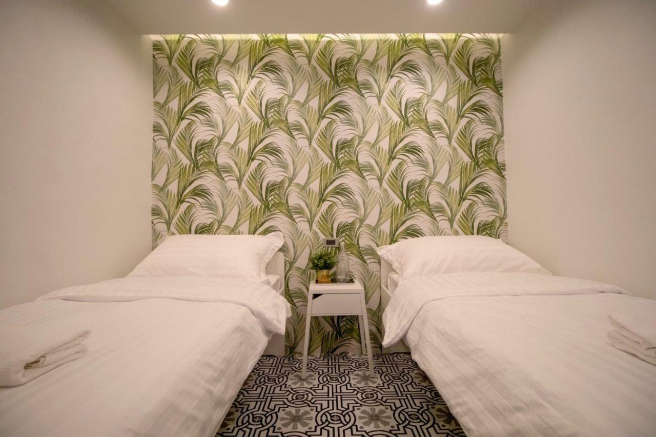 Chambre Lits Jumeaux avec Salle de Bains Privative (Sans Fenêtre)